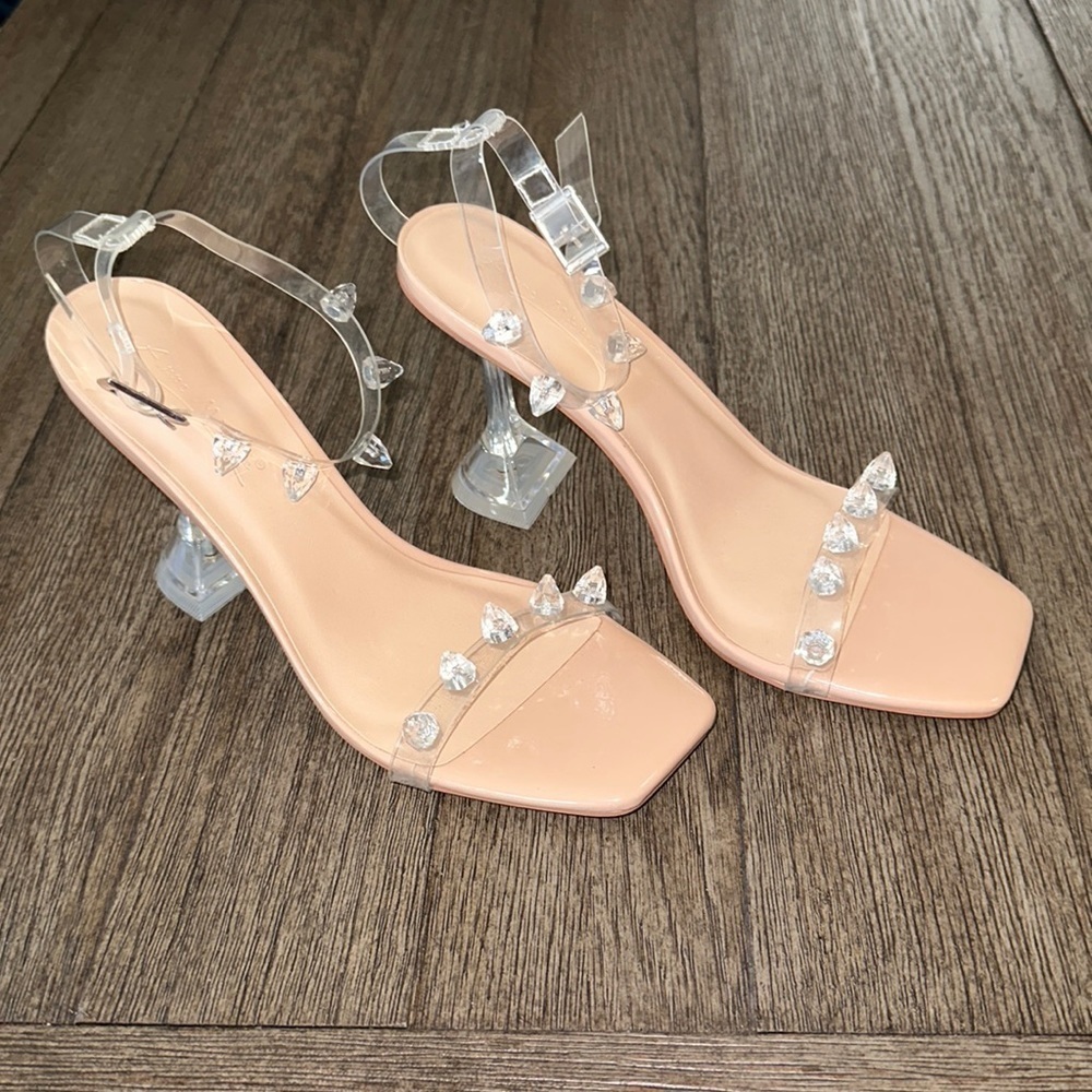Anne Michelle Pleasure Gem Embellished Lucite Vinyl
Strap Pyramid Heels